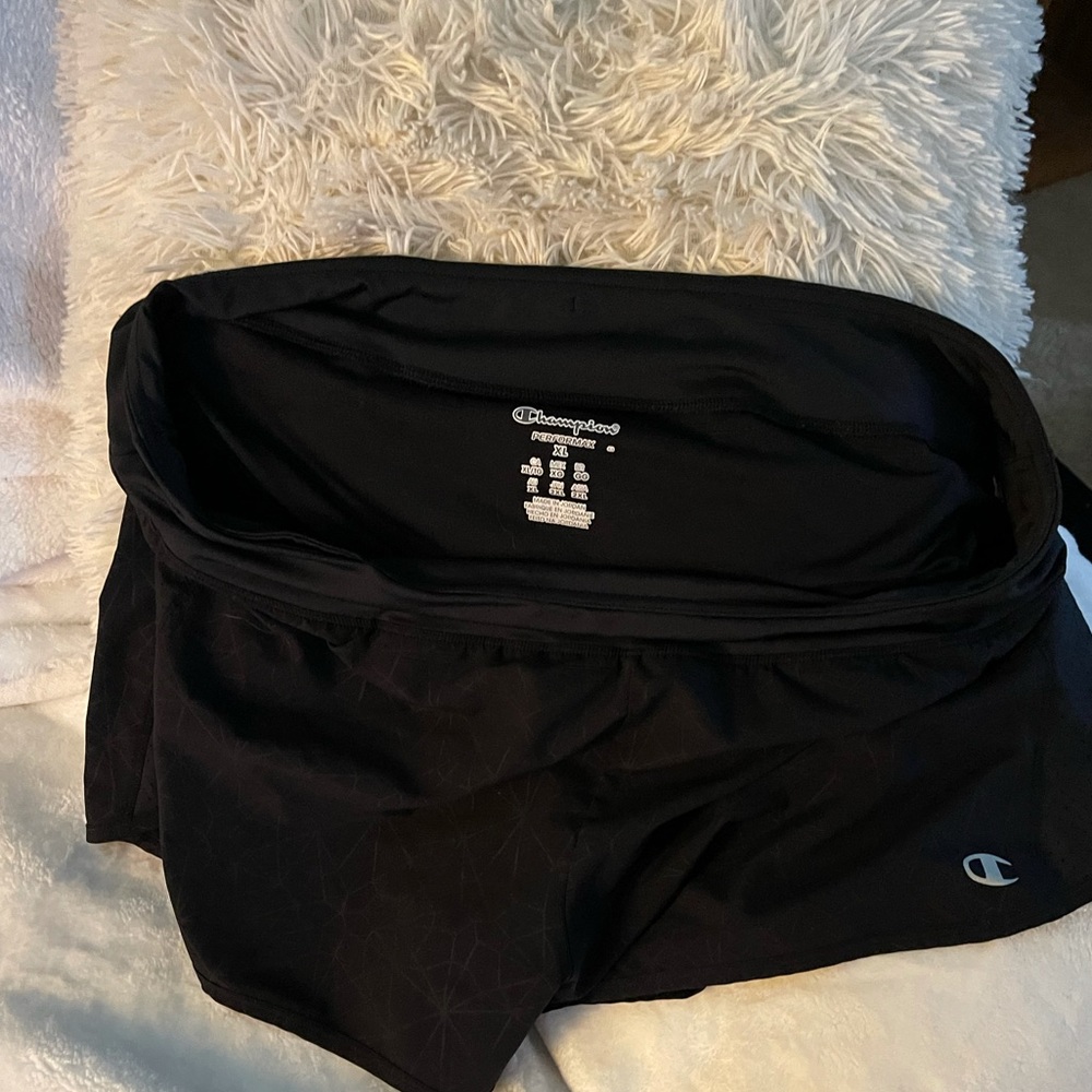 Women’s Black XL Champion Performax running short.